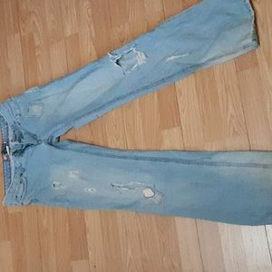 Duckhead distressed jeans with cherry on back pocket
